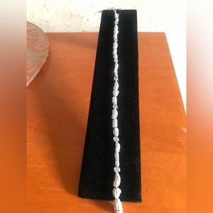 Nadri crystals bracelet in silver tone setting. New with tag.